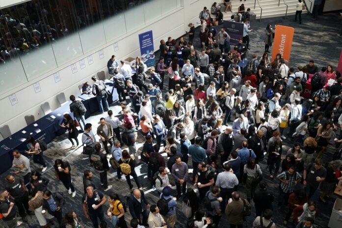 Image of individuals at a cofnerence.