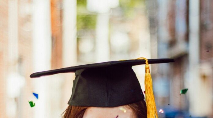 Is a PhD Right for You? A Guide for Master’s Students Image of a woman at graduation.